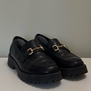 Elegant Black Loafers with Gold Accent